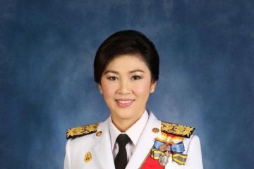 泰国美人总理英拉流亡国外近来频频呈现各地是想回归政坛吗