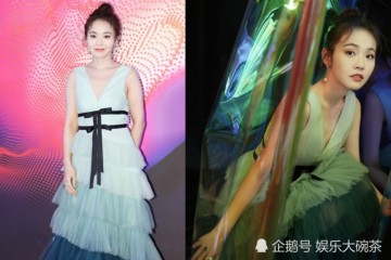 张佳宁自始自终的新鲜丸子头绿纱裙展安静容貌莞尔一笑似天仙