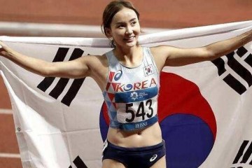 身段傲人的田径女神因身披国旗走美女值太高被质疑整容