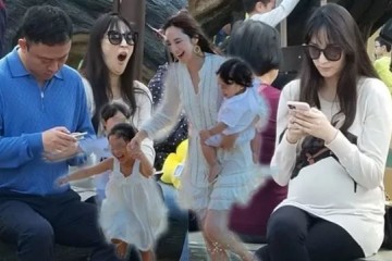 纪晓波一家游主题乐园42岁吴佩慈挺巨肚累得直打哈欠