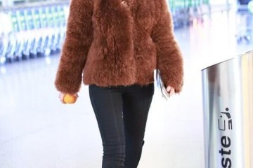 马苏一身熊装走机场造型尽管心爱但仍不显嫩看着有点胖