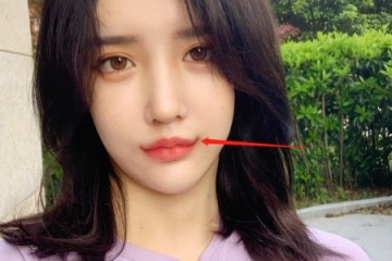 艾比剪短发后晒自拍浅笑唇成功抢镜这是在仿照潘南奎吗