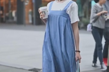 街头有一种从脖子开端穿的病号裤比一般裤子长2倍巨显高